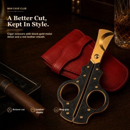 stainless steel cigar scissors cutter with leather storage sheath on a cigar table